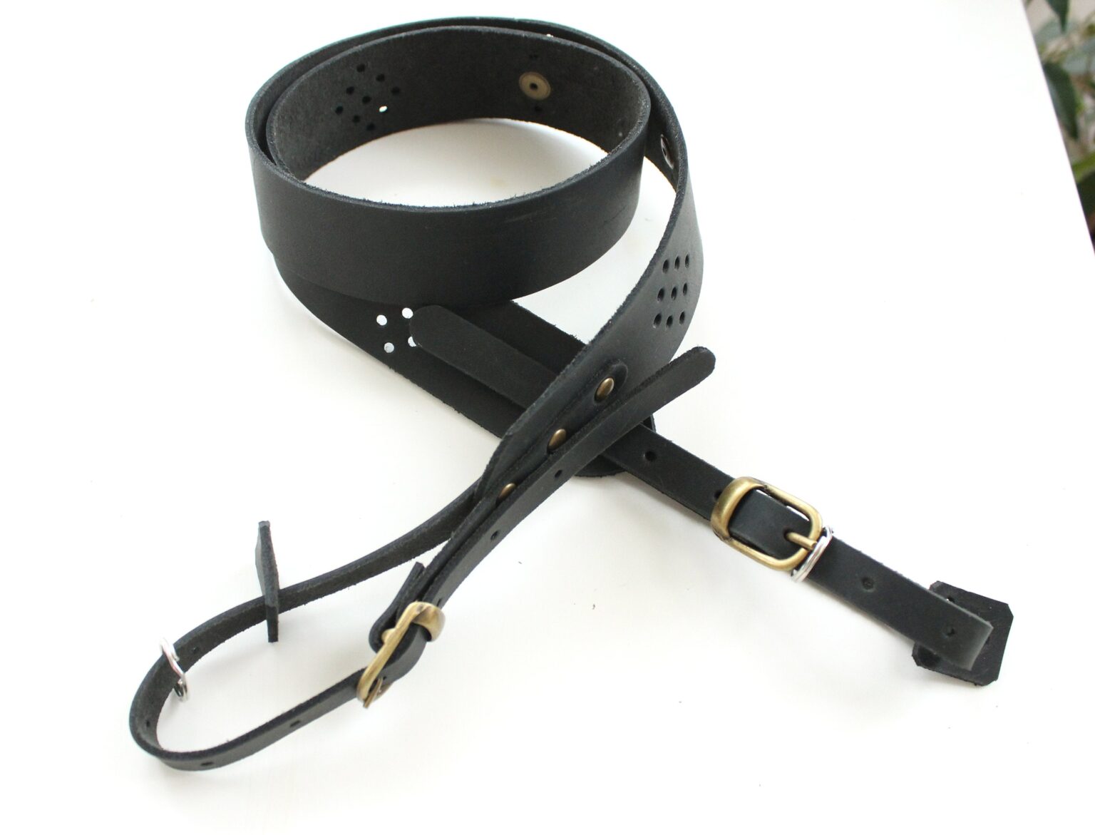 Handmade wide leather camera strap perforated Anger Refuge